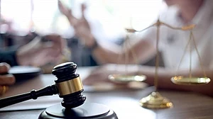 SP leader booked under Gangster Act for land grab