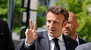 Re-elected Macron vows to 'heal divisions' in France