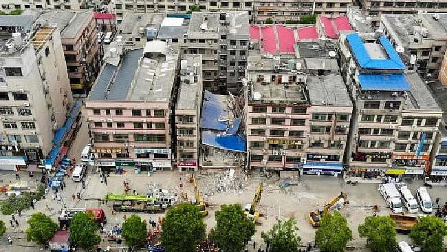 Over 20 trapped, 39 missing in China building collapse; President Xi orders all-out efforts for rescue