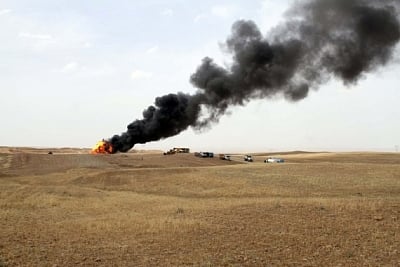 3 rockets land near air base housing US experts in W. Iraq