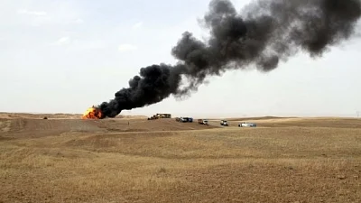 3 rockets land near air base housing US experts in W. Iraq