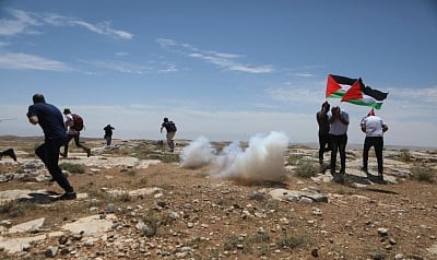 Palestinian teen killed, 90 injured in West Bank clashes