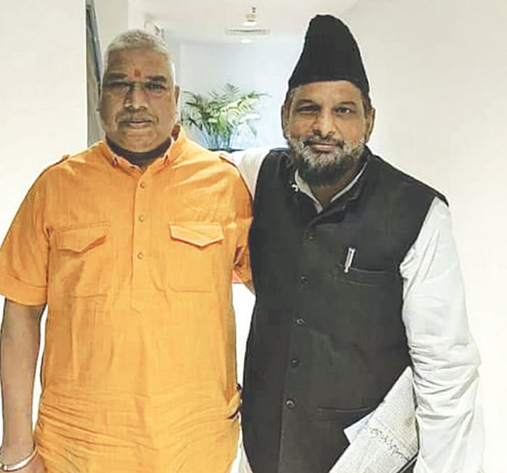 Brothers in arms? Two TV panelists outside the studio