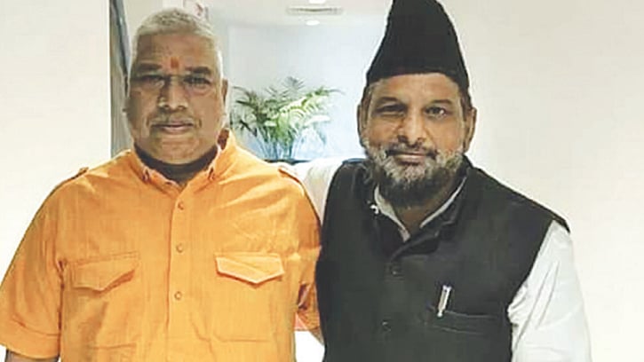 Brothers in arms? Two TV panelists outside the studio