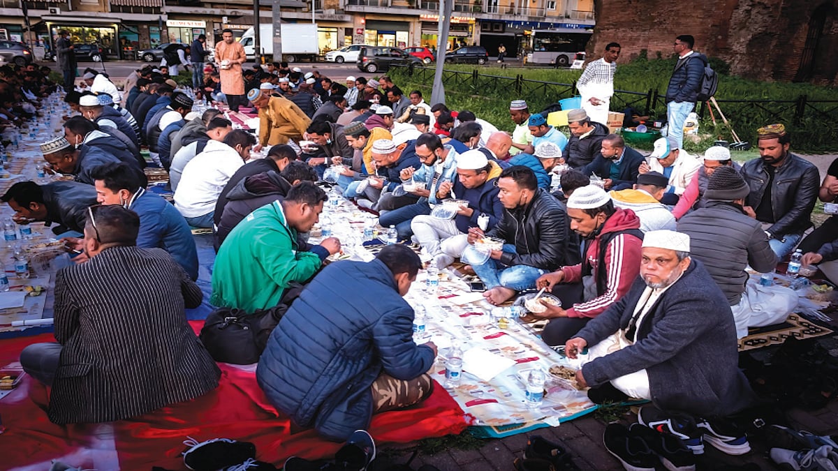 Bangladeshi immigrants break the Ramzan fast (Iftar) in Italy