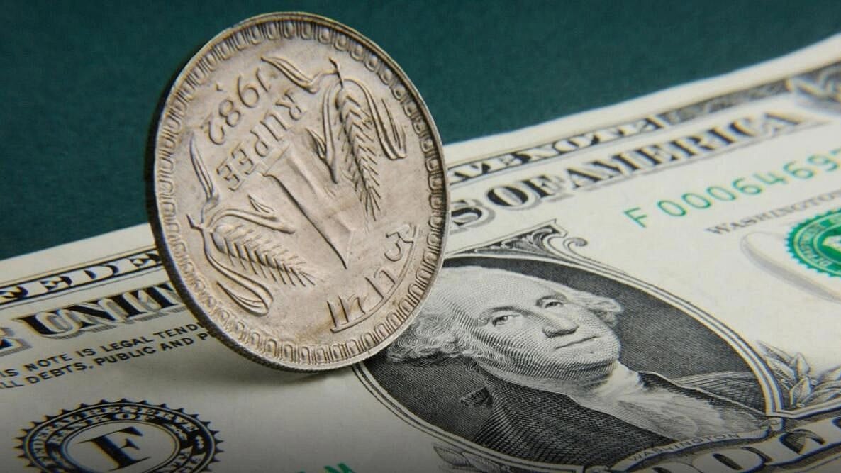 Rupee falls 14 paise to 82.35 against US dollar in early trade
