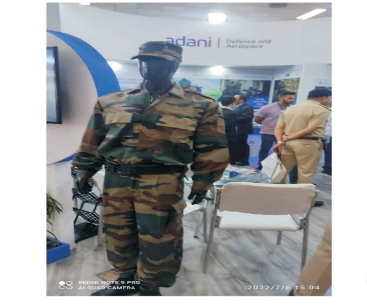 OFB employees demand action against Adani Group for violating Patent Act & showing army uniform at Police Expo