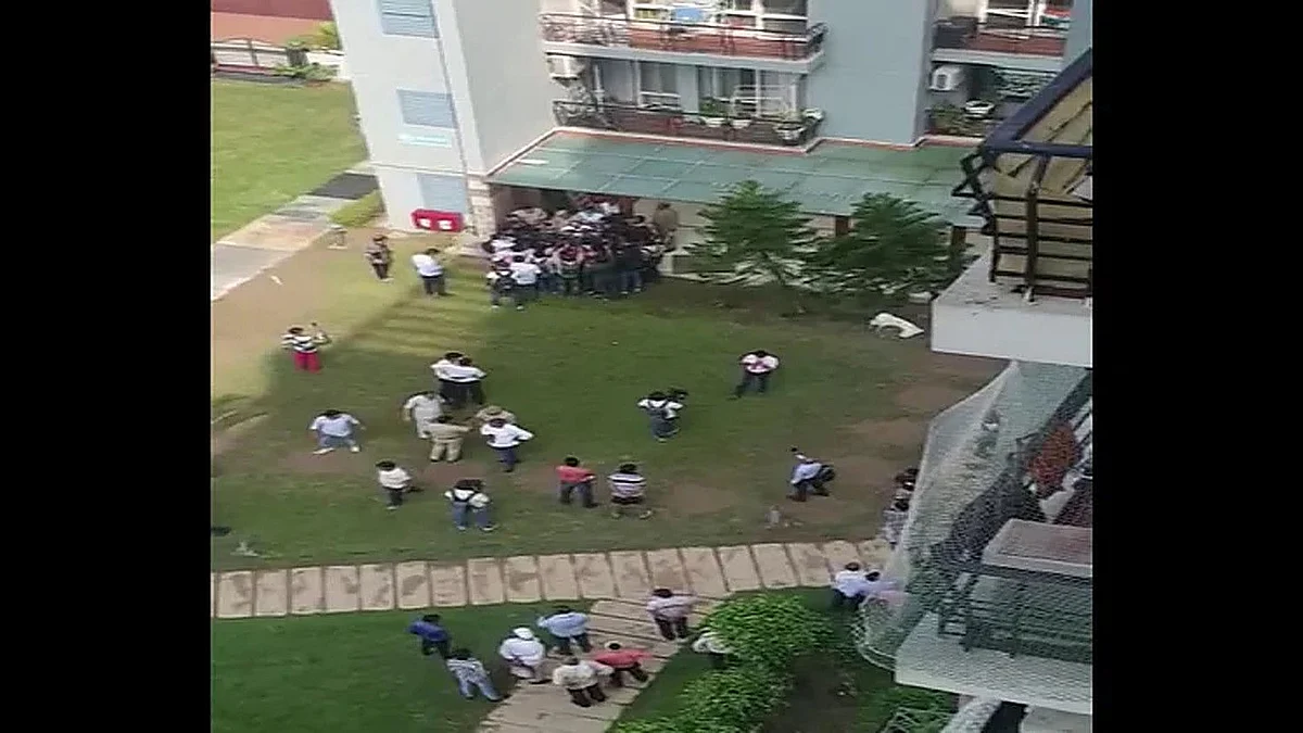 Bulldozer removes illegal structures outside politician Shrikant Tyagi's Noida flat