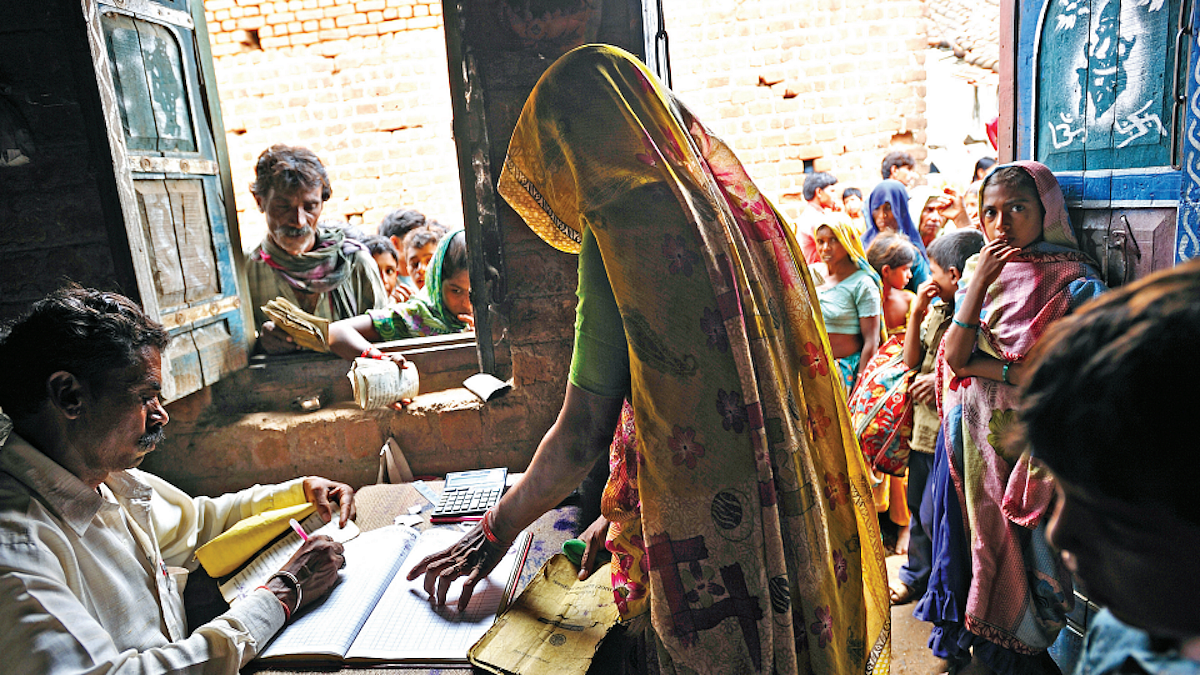 Free ration being distributed under Pradhan Mantri Garib Kalyan Yojana in UP's Dasna town in Ghaziabad district. (Photo: Getty Images)