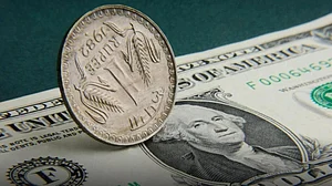 Rupee plunges 61 paise to dip below 83-mark for first time against dollar
