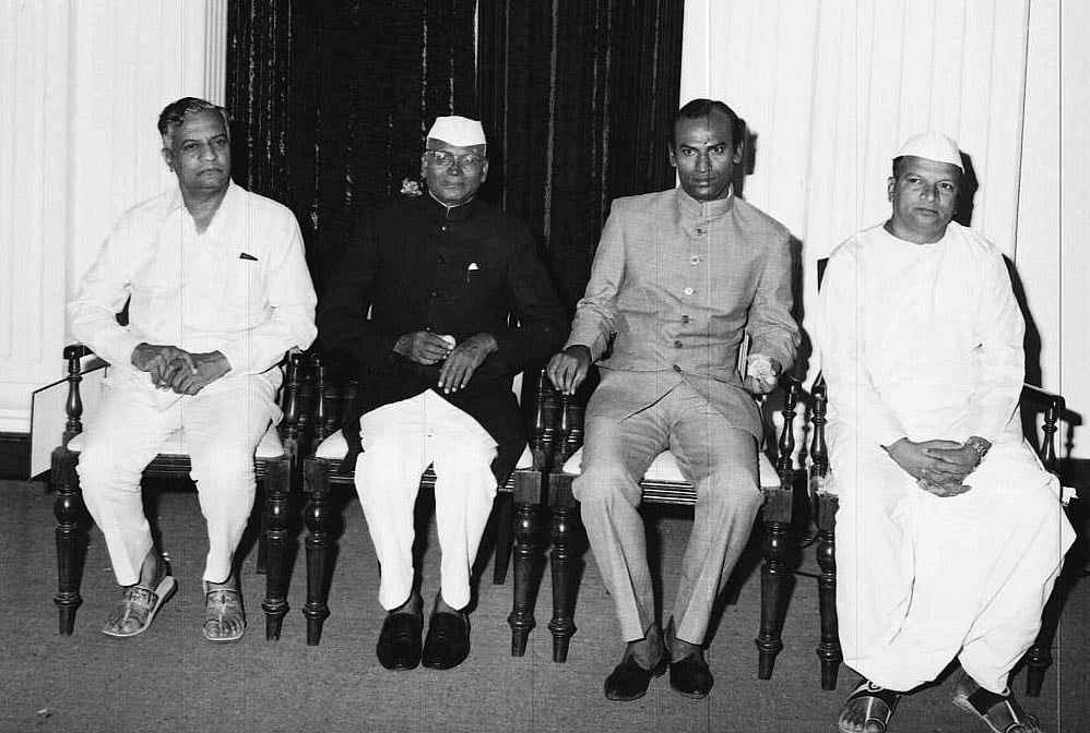 Vasant Rao Desai, K Prabhakar and Mallikarjun Kharge after he was sworn in as MoS for primary education in the Urs cabinet, 1976