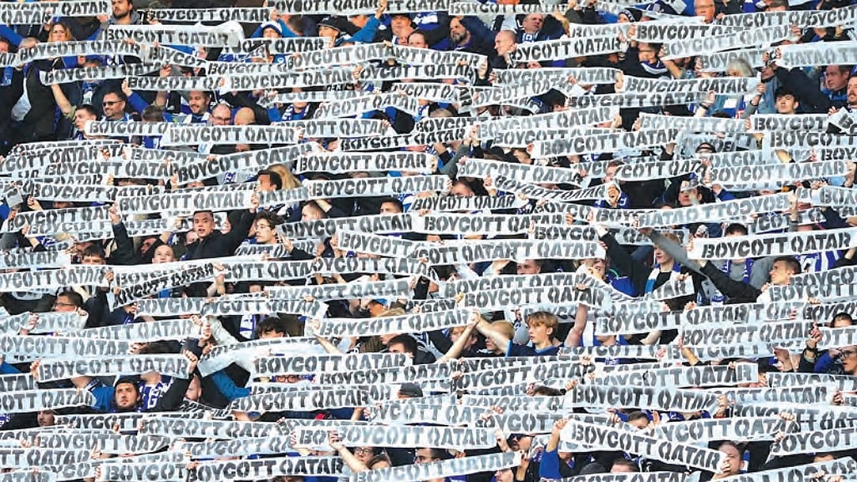 Hertha’s fans demonstrate in Berlin with banners for a boycott of the World Cup in Qatar, 12 November 2022.