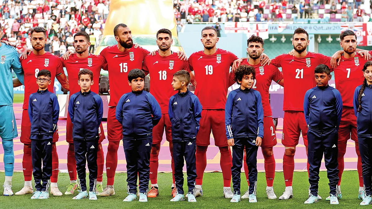 Iranian players line up for the national anthem prior to the FIFA World Cup Group B match with England at the Khalifa International Stadium on 21 November 2022 in Doha, Qatar.