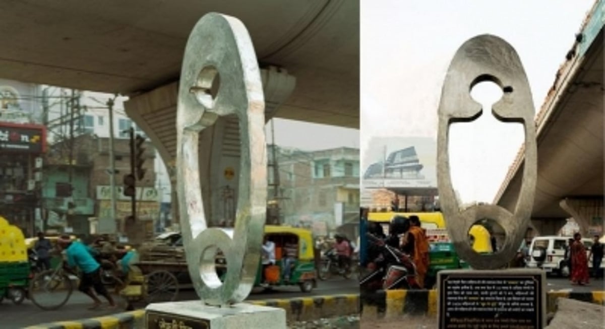A giant safety pin highlighting dignified healthcare for women