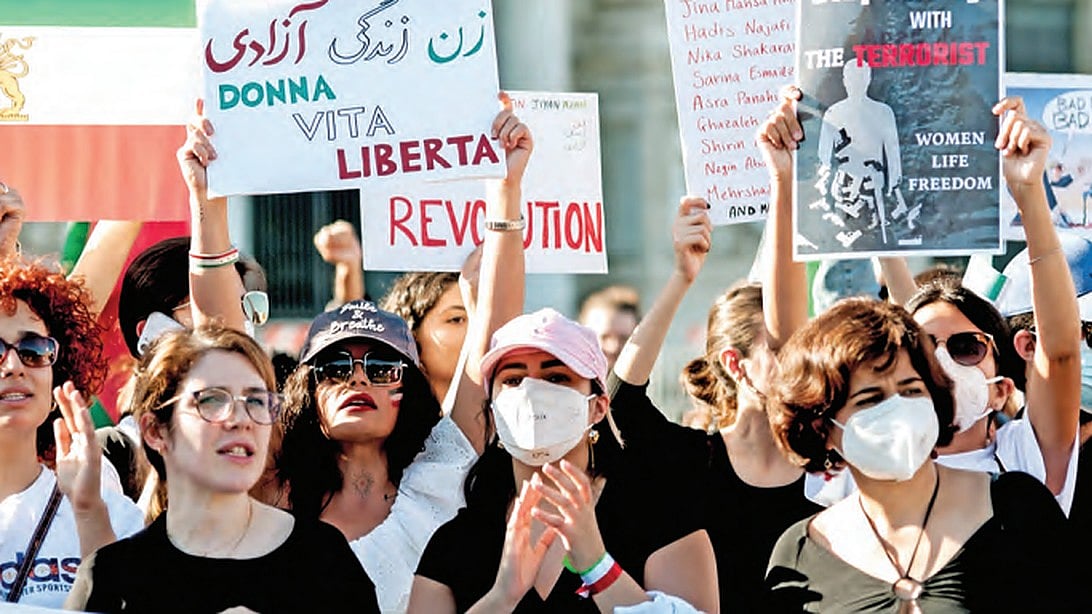 Women in central Rome protest against the death of Mahsa Amini in the custody of Iran’s religious police in September