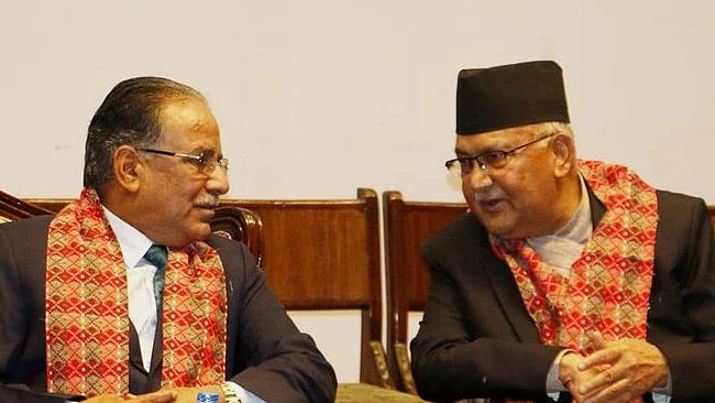 Pushpa Kamal Dahal 'Prachanda' (left) with K.P. Oli