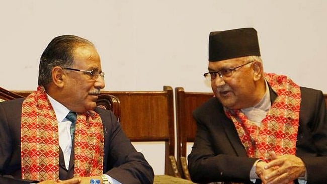 Pushpa Kamal Dahal 'Prachanda' (left) with K.P. Oli