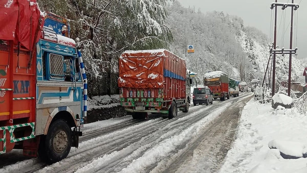 Vehicles left stranded on the Jammu-Srinagar National Highway that was closed for traffic due to shooting stones. (Photo: IANS)