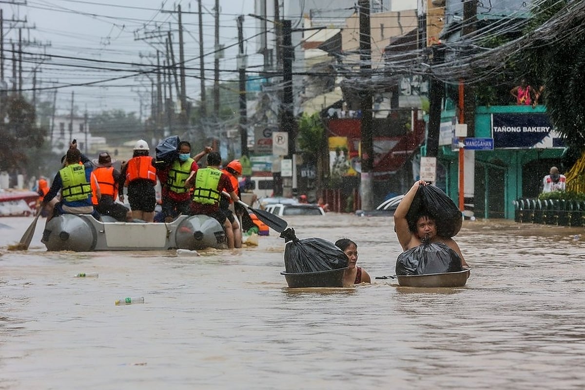 Death toll in Philippine floods reaches 13, missing 23