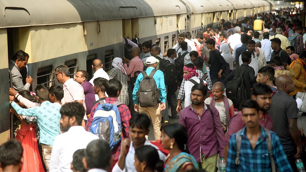 A crowded Patna Junction railway platform as hundreds board trains to reach home ahead of Diwali and Chhath Pooja, October 2022