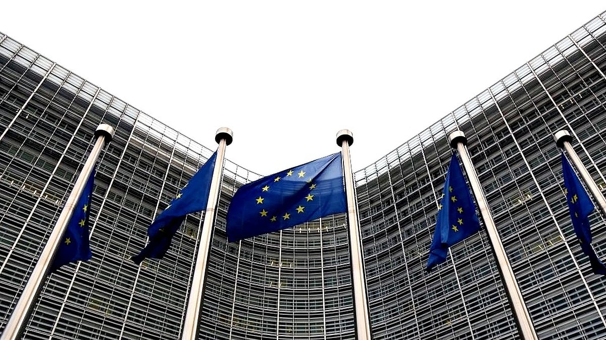 EU flags are seen outside the European Commission in Brussels, Belgium, Jan. 6, 2023. (Photo: Xinhua/Zheng Huansong/IANS)