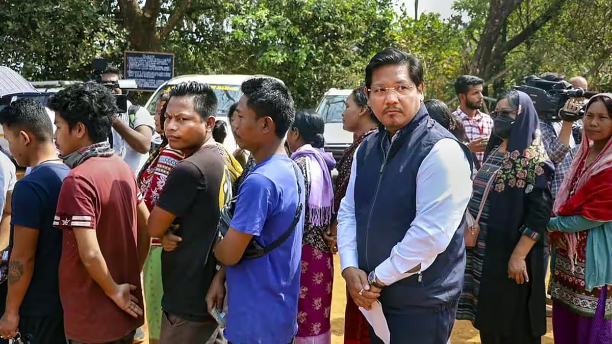 Meghalaya Chief Minister Conrad K Sangma in a queue outside a polling booth