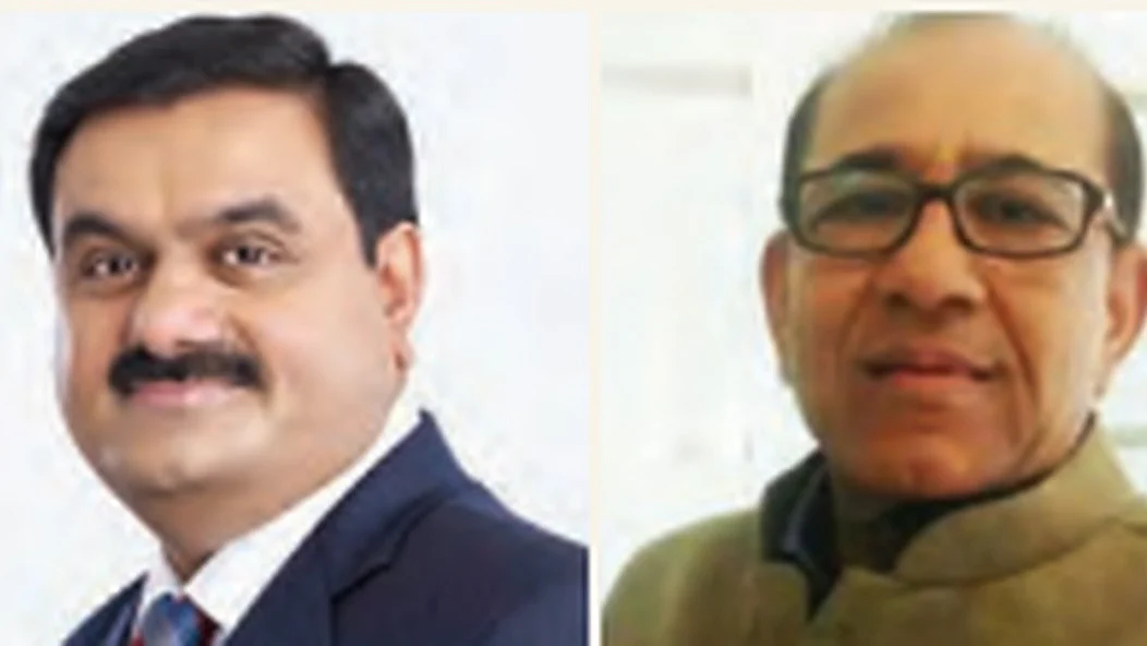 Gautam Adani; (right) Vinod Adani