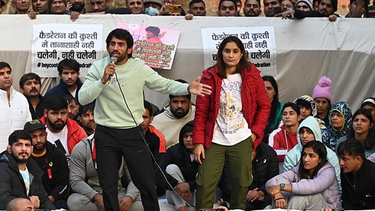 Bajrang Punia and Vinesh Phogat leading the protest