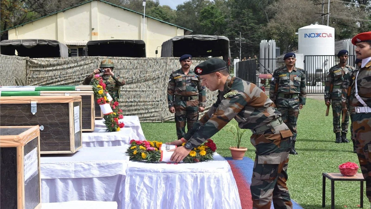 Soldiers paying tribute to those killed in the Poonch attack