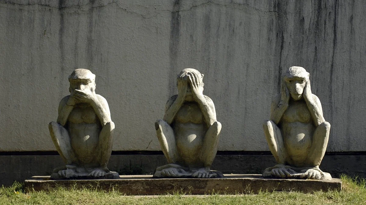 The three monkey statues situated in the grounds of Mahatma Gandhi's Satyagraha Ashram, Ahmedabad, depicting the saying 'see no evil, hear no evil, speak no evil'. (Photo: Rebecca Naden—PA Images, via Getty Images)