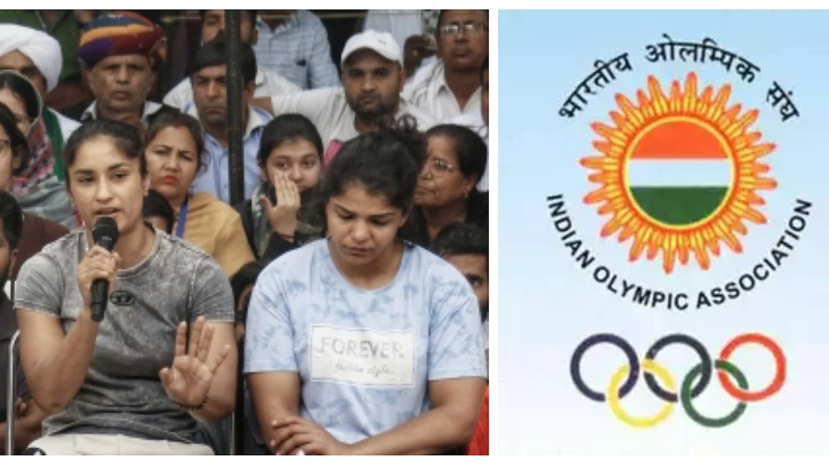 Protesting wrestlers Vinesh Phogat (left) and Sakshi Malik at Jantar Mantar; Indian Olympics Association logo (photo: IANS)