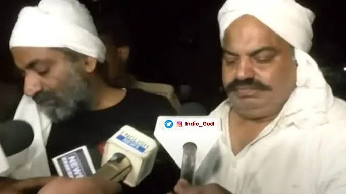 Atiq Ahmed (right) and his brother Ashraf (left)