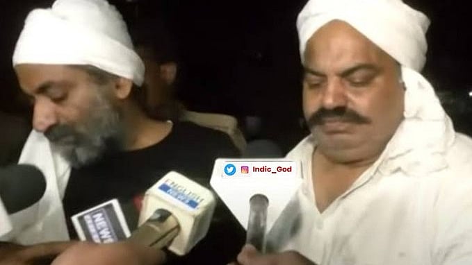 Atiq Ahmed (right) and his brother Ashraf (left)