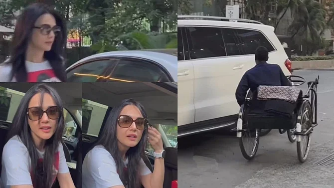 Indian paparazzi captured a man in a wheelchair following Zinta's car after she left in hurry refusing to stop for photos.
