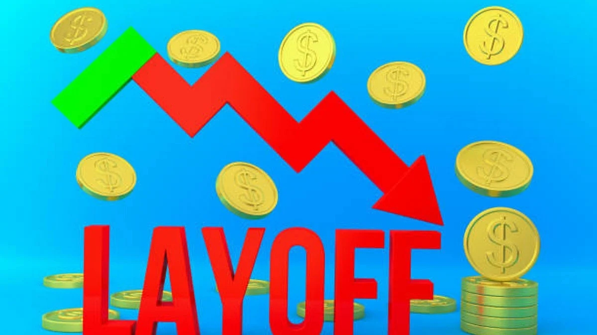The text Layoff surrounded by gold dollars