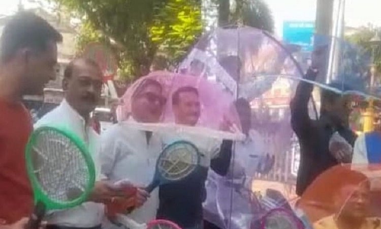 MP: Congress workers stage protest with mosquito nets in Indore