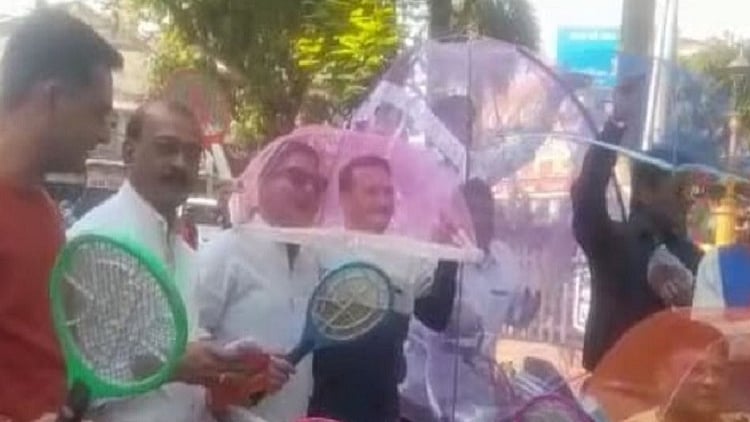 MP: Congress workers stage protest with mosquito nets in Indore