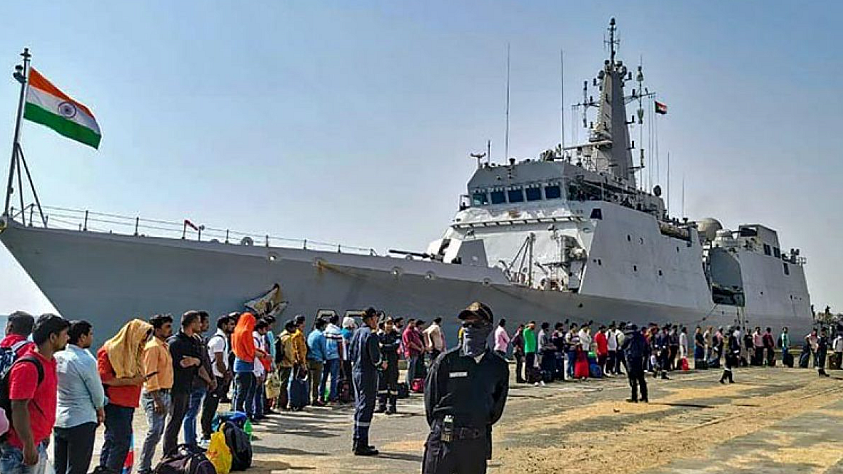 Port Sudan: Stranded Indians queue up to board INS Sumedha as they are leaving violence-hit Sudan for Jeddah under 'Operation Kaveri', in Port Sudan, Tuesday, April 25, 2023 (Source: PTI)