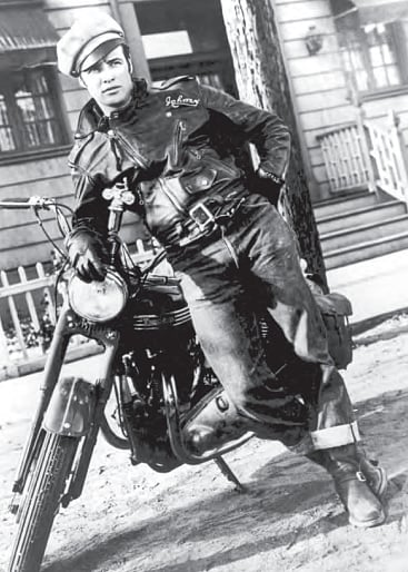 Marlon Brando gave us the classic biker look that rules even today when he added leather jacket, boots and a motorcycle to the 501s he strutted in the The Wild One.