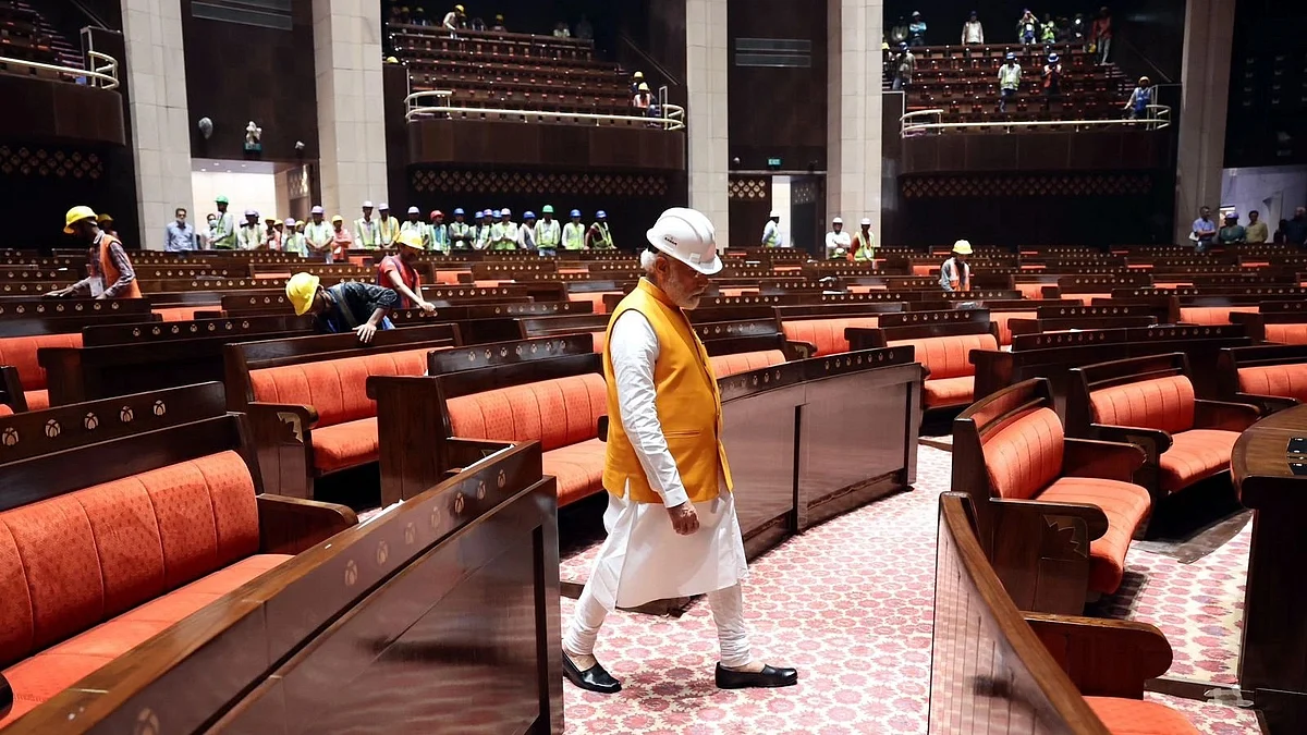 PM Modi in a hard hat during the outfitting of the new sansad building (photo: PMO)