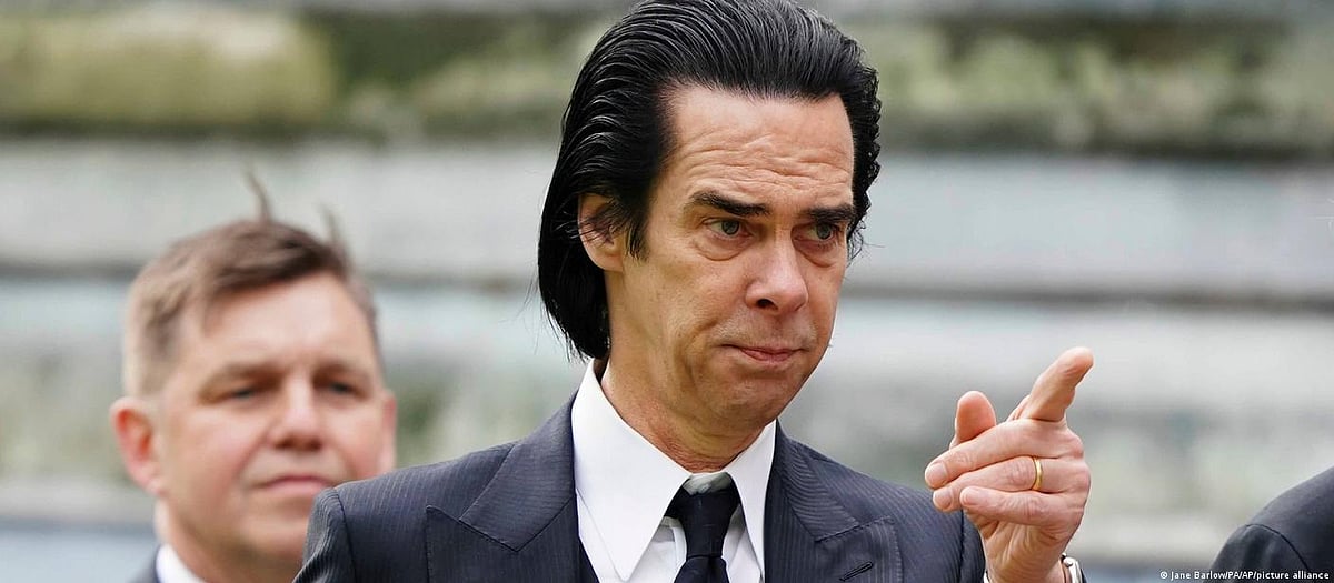 Nick Cave, one of the many musicians and artists invited to the coronation arrives at Westminster Abbey.