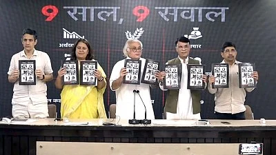 Congress released a booklet titled '9 saal 9 sawaal’ (photo: IANS)