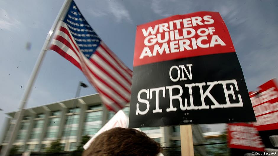 A placard that says 'Writers Guild of America On Strike'