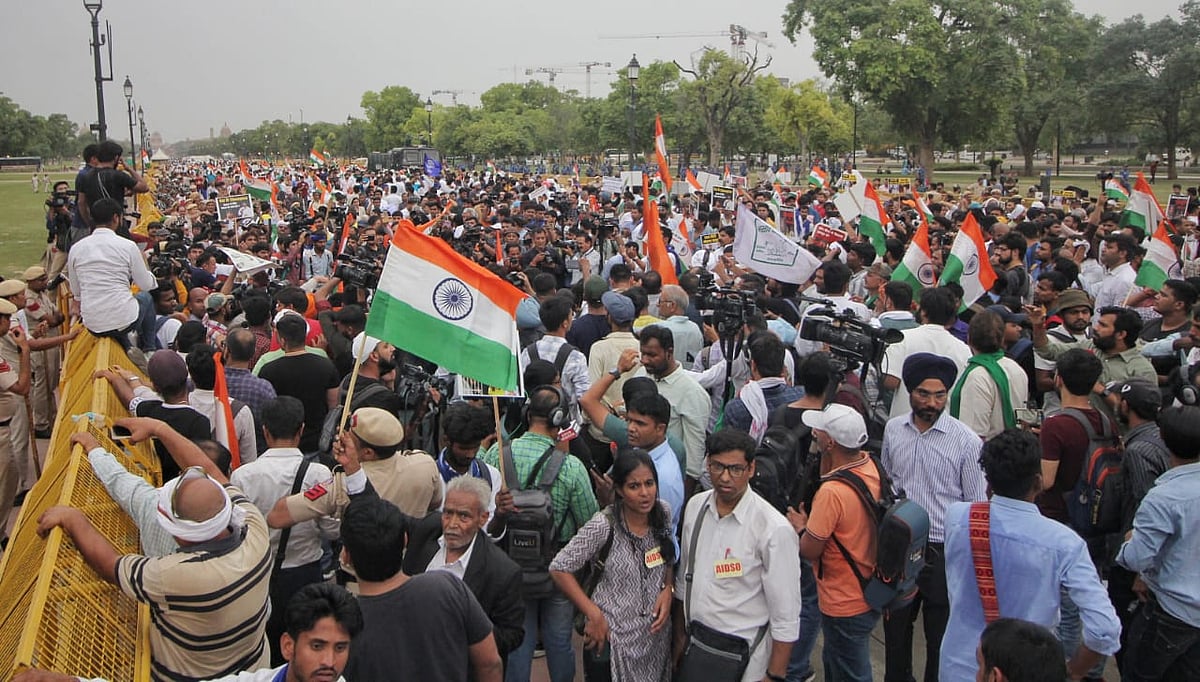 Protesters holding the Indian flag (NH Photos by Vipin)