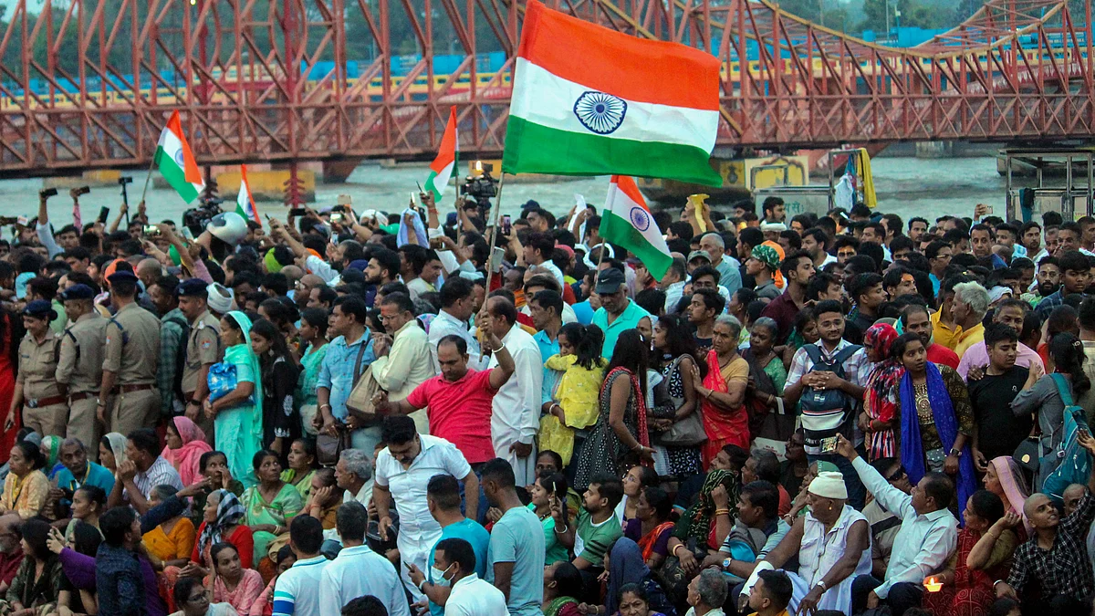 Huge crowds gathered at Haridwar on the banks of the Ganga on Tuesday, May 30, in support of the wrestlers who intended to immerse their World and Olympic medals as a symbolic act of protest against against the WFI chief. (Photo courtesy: PTI)
