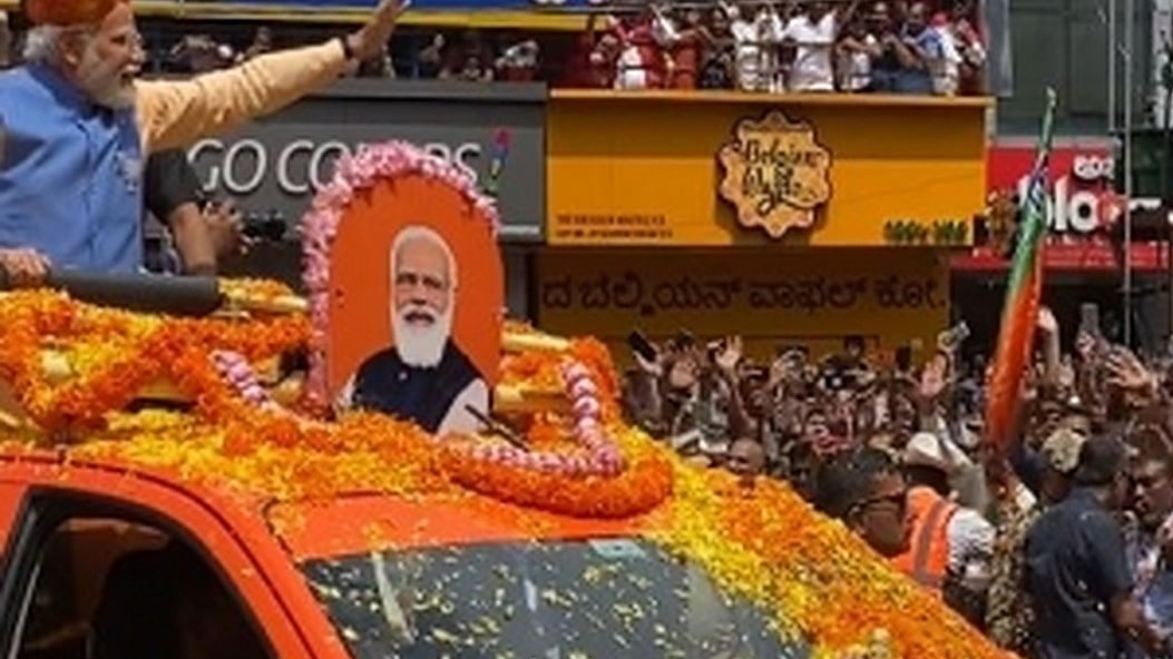 Prime Minister Narendra Modi on Saturday began his mega roadshow in Bangalore as part of his election campaign for the May 10 Assembly polls (Photo: IANS)