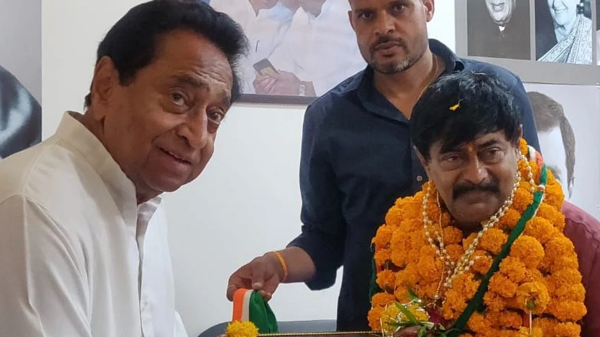 Former BJP minister Deepak Joshi (right) Joined Congress in the presence of Kamal Nath