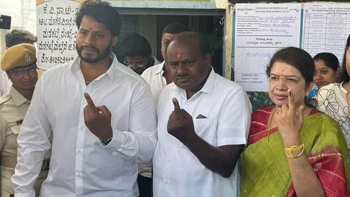 Karnataka polls: Kumaraswamy wins but son Nikhil loses