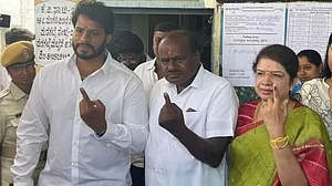 Karnataka polls: Kumaraswamy wins but son Nikhil loses