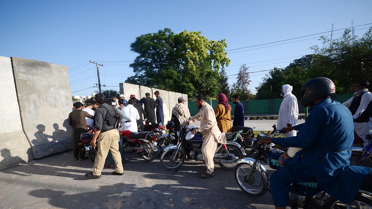 Cantt Road and Motorway are blocked, as police use tear gas canisters to disperse protests against Imran Khan's arrest in Peshawar, Pakistan on May 10, 2023. (Photo: Getty Images)